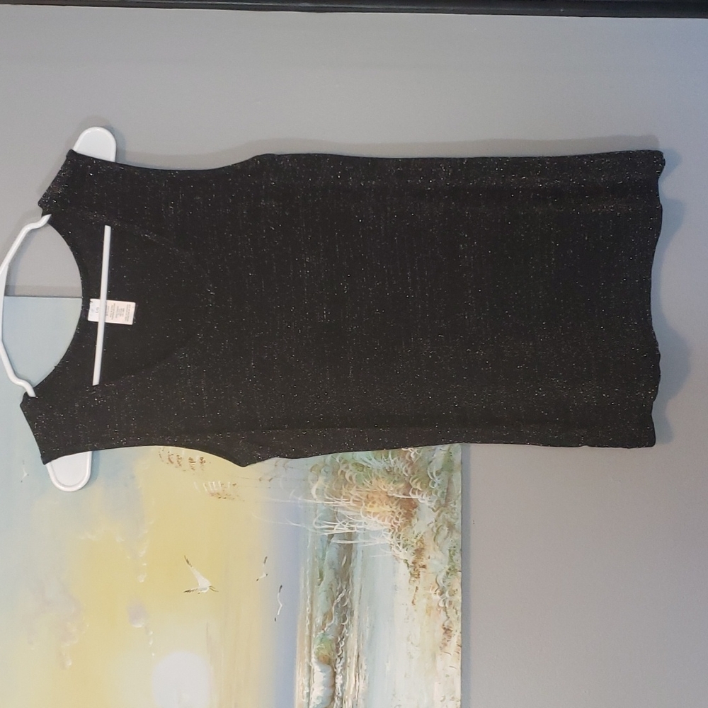 Tank top with 2% metallic giving top a sparkle. Size large
